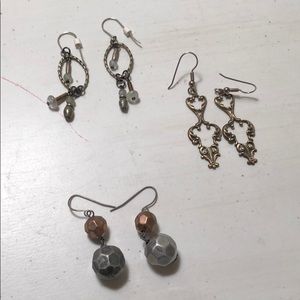 Set of three dark gold earrings